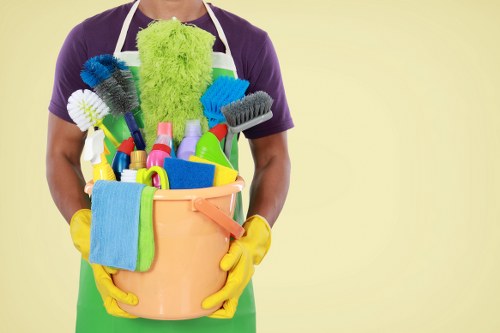 Carpet cleaning technician in W13 preparing equipment safely